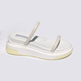 white puffy ergo sandal